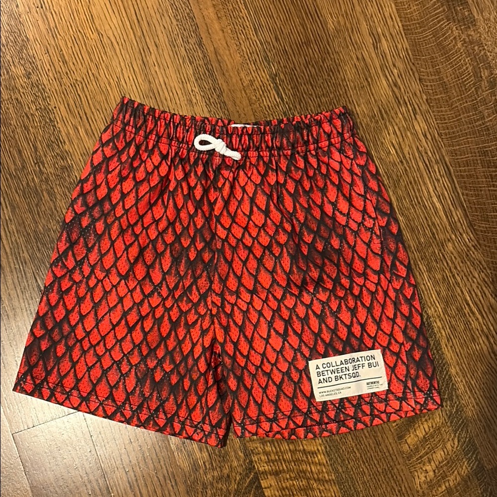 BKTSQD Red and Black Patterned Shorts. YXL